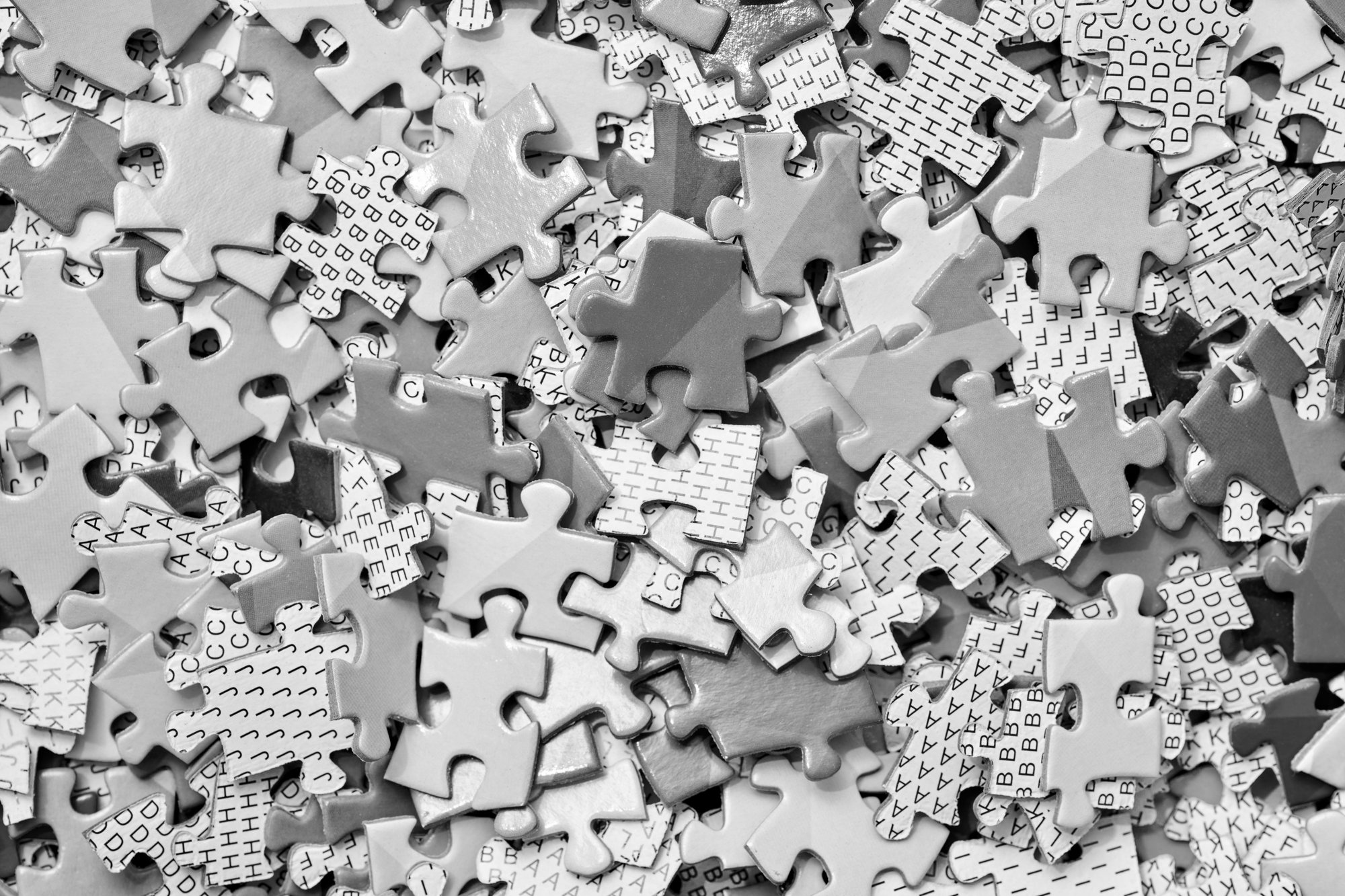 A pile of jigsaw puzzle pieces